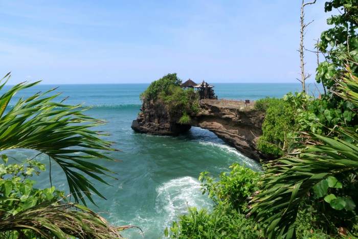 Tanah Lot temple complex on a cliff and a lush green in Bali indonesia 