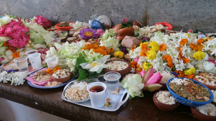 temples and sacred sites of sri lanka - colourful food and flower offerings in the bodhi tree temple in sri lanka 