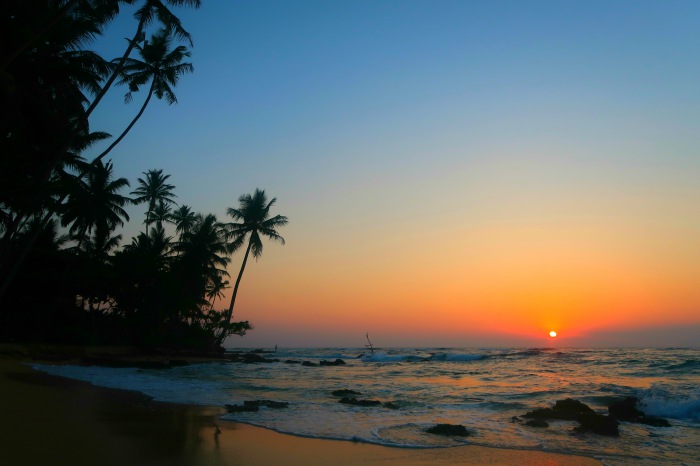 paradise beach sunset in unawatunain sri lanka 