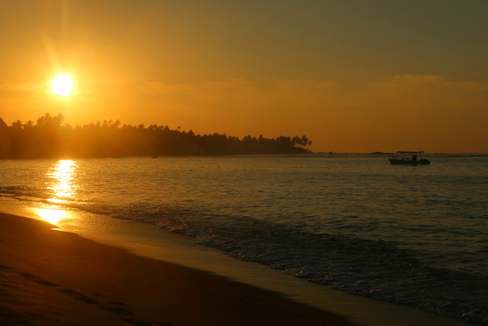 sunrise on the beach in unawatuna sri lanka 
