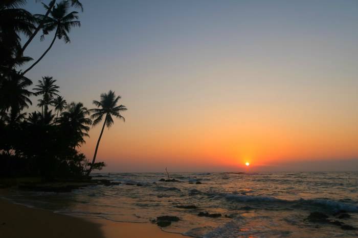 magical sunset at the paradise beach in unawatuna sri lanka 