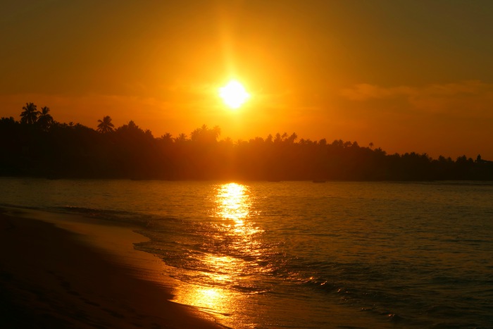 golden sunrise on the beach in unawatuna sri lanka 