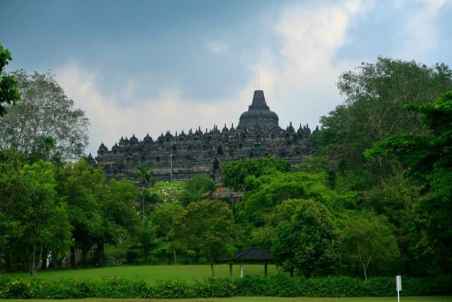 borobudur temple surrounded by green jungle in java indonesia 
