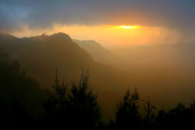 sunrise on a foggy morning above the bromo volcano in java indonesia 